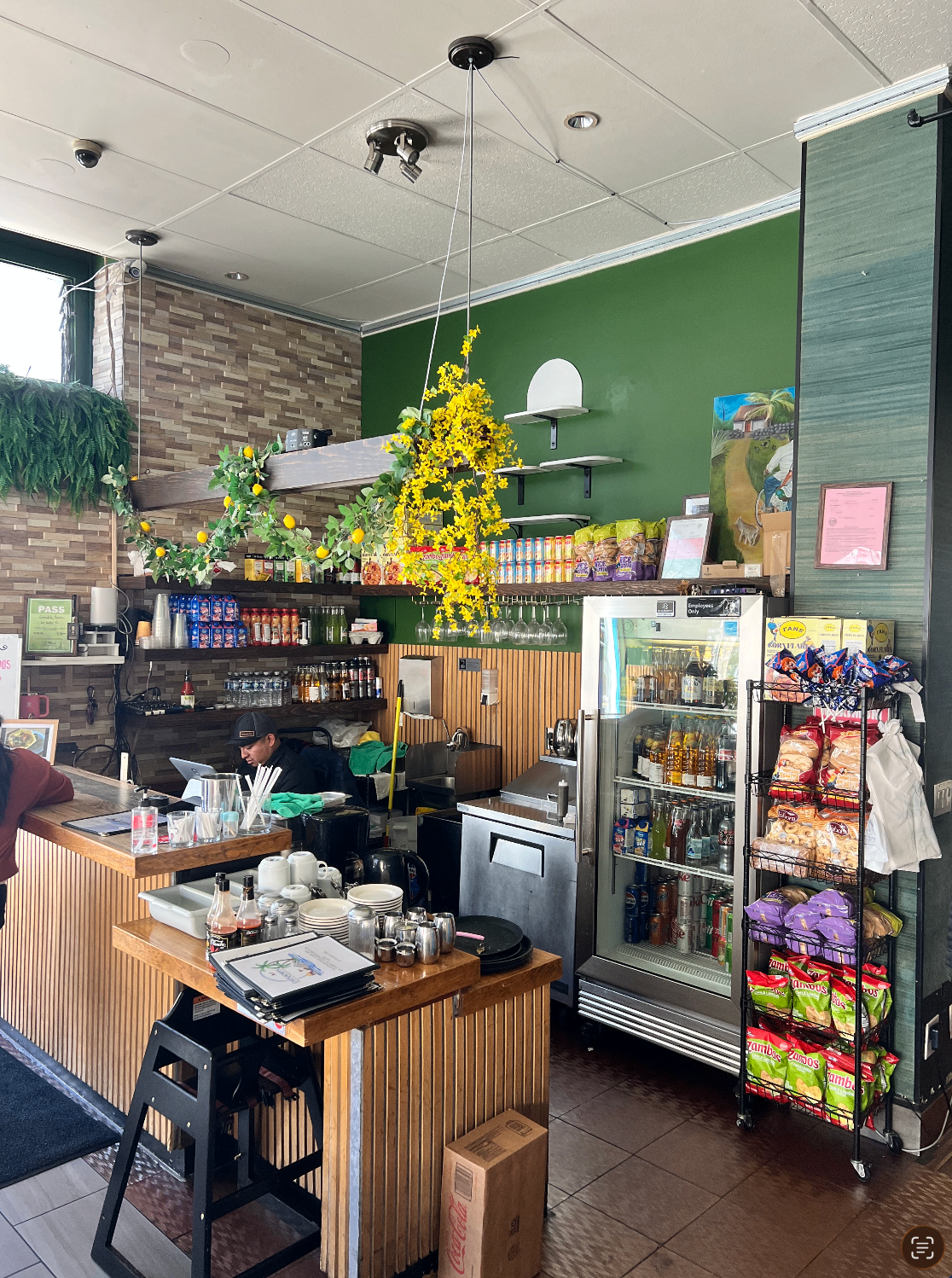 Bar counter with pastries, drinks and Honduran snacks